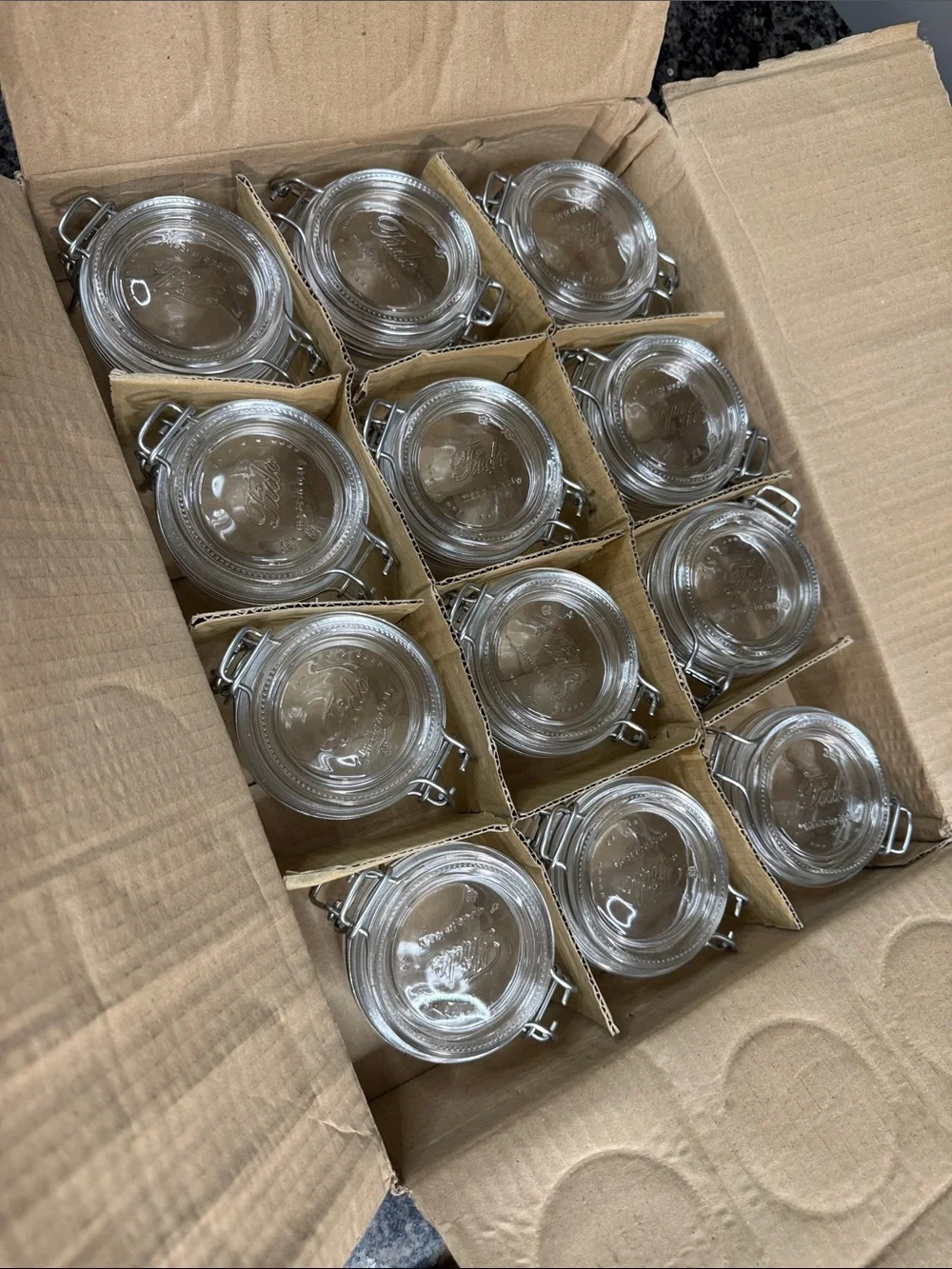 Luigi Bormioli Clear Clip-Top Glass Jar with Embossed Lid 4.25 oz